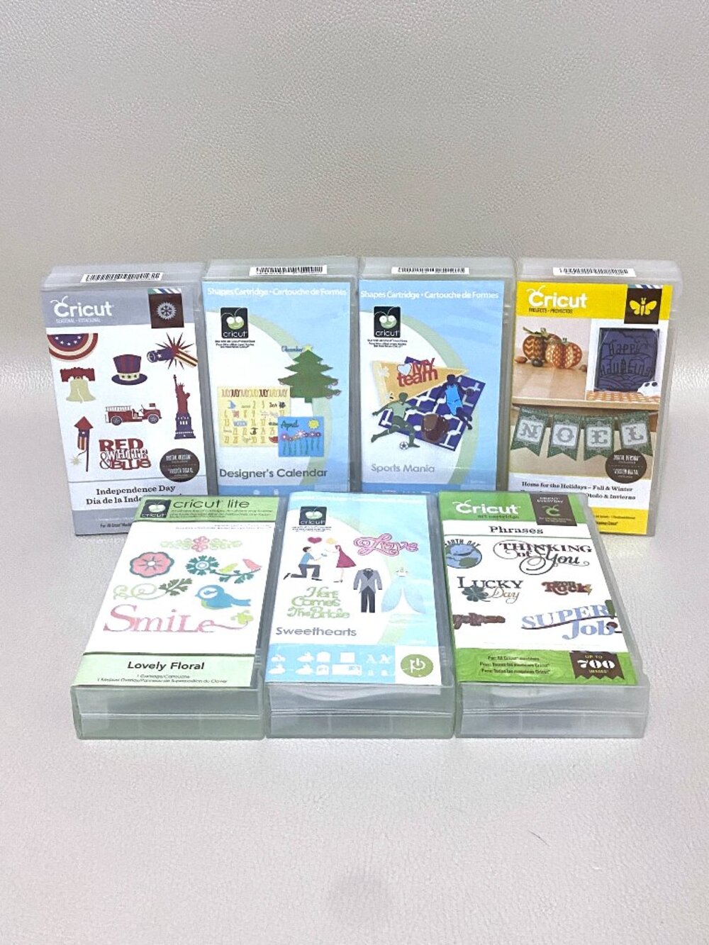 Lot of 7 NEW Cricut Cartridges Sports Mania Calendar Floral Phrases Holiday